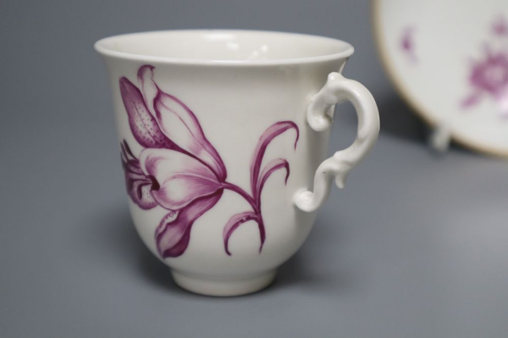 A Vienna puce en camaieu cup and trembleuse saucer, diameter 13.5cm (repair) and a similar Furstenburg cup and saucer, late 18th centur